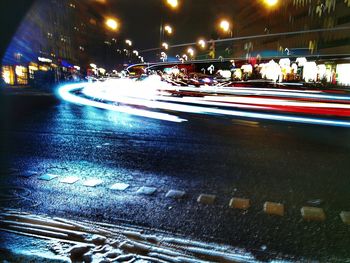 Light trails on city street at night