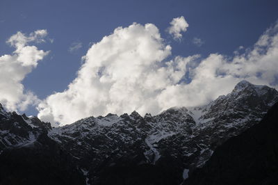 Low angle view of mountains against sky