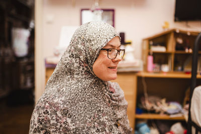 Portrait of young woman wearing mask