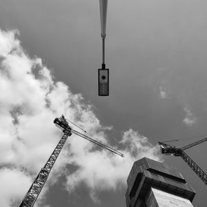 Low angle view of street light against sky