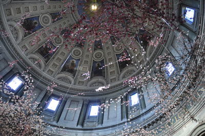 Low angle view of illuminated building in city