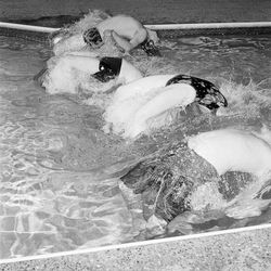 Man swimming in pool