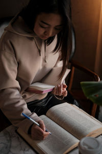 Young student studying at home