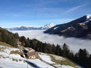 Scenic view of snow covered mountains