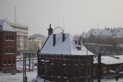 City against sky during winter