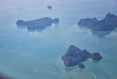 High angle view of rocks in sea