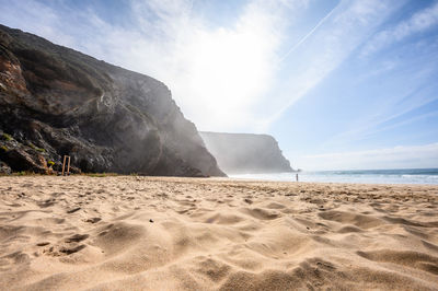 Scenic view of beach against sky