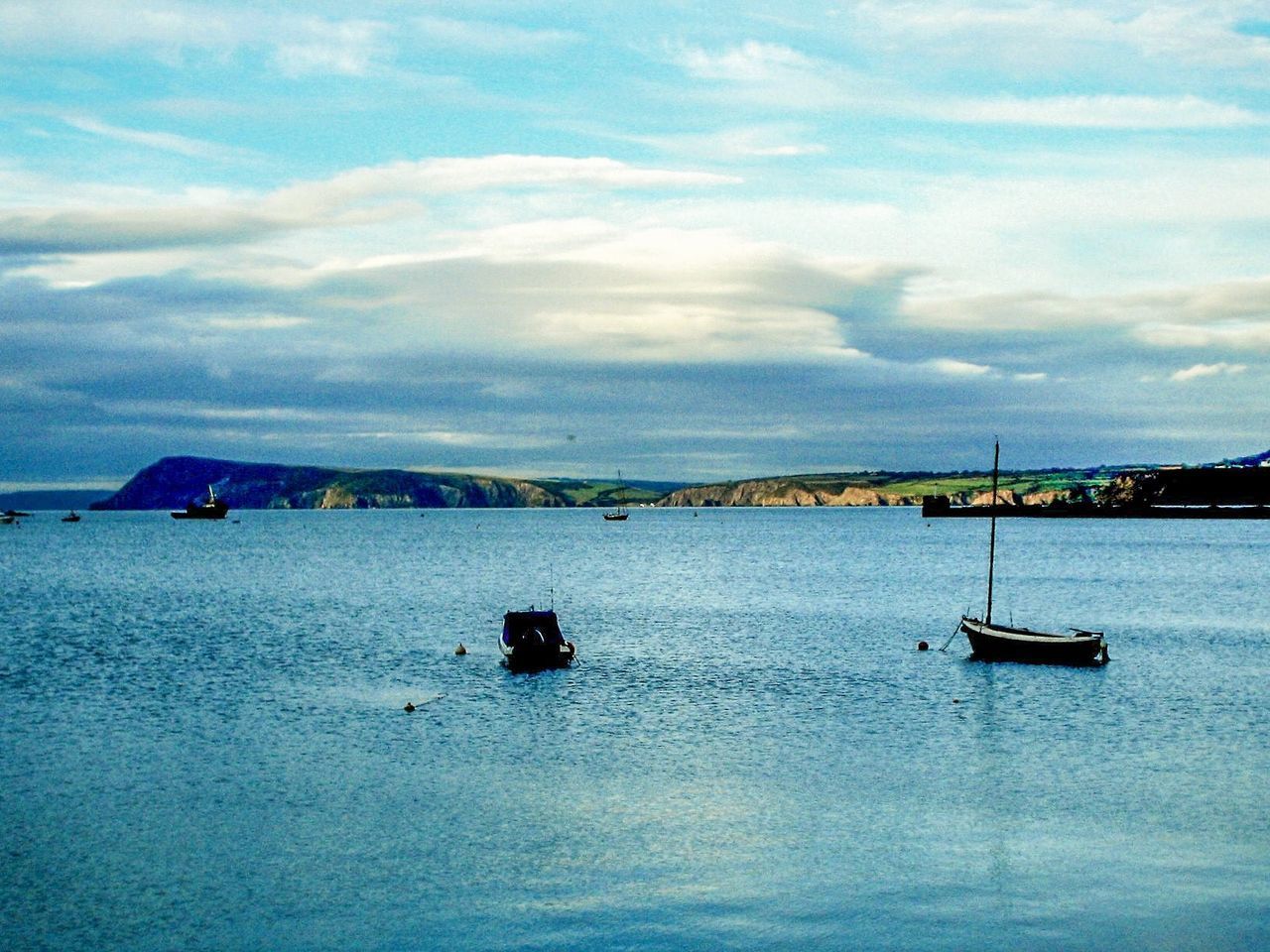 SCENIC VIEW OF SAILBOAT IN SEA