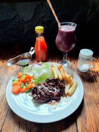Close-up of food served on table
