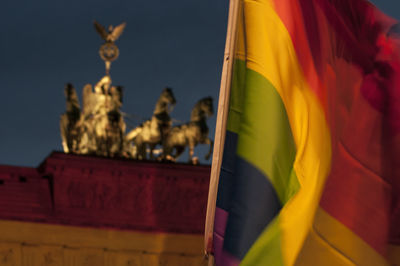 Low angle view of statue against sky in city