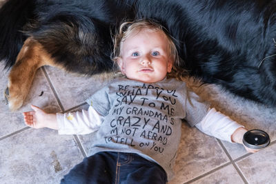 High angle view of girl with dog