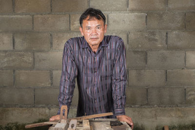 Carpenter working in carpentry workshop