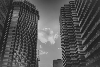 Low angle view of skyscrapers against sky