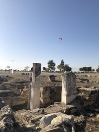 Built structure on rocks against clear sky