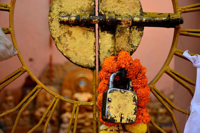 The key was attached to the gold leaf on the iron door and the garland of gaya, india.