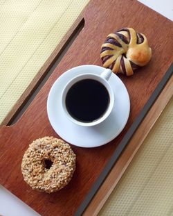 High angle view of coffee cup on table