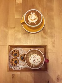 High angle view of coffee cup on table