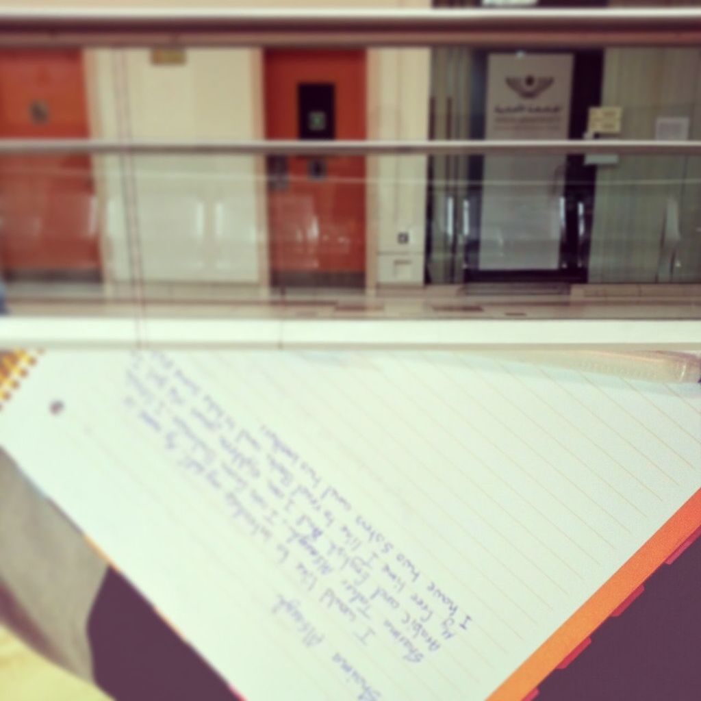 indoors, text, communication, western script, selective focus, book, education, close-up, focus on foreground, built structure, window, no people, architecture, day, in a row, office, paper, table, number, technology