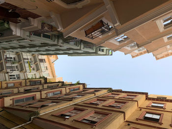 Low angle view of buildings against clear sky