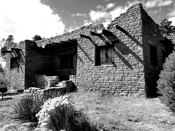 Low angle view of old building against sky