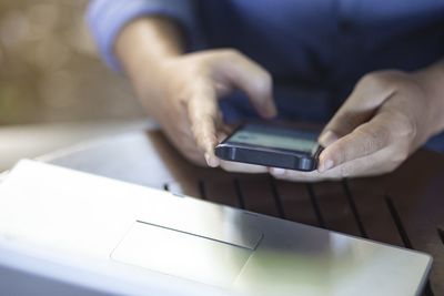 Close-up of man working on table