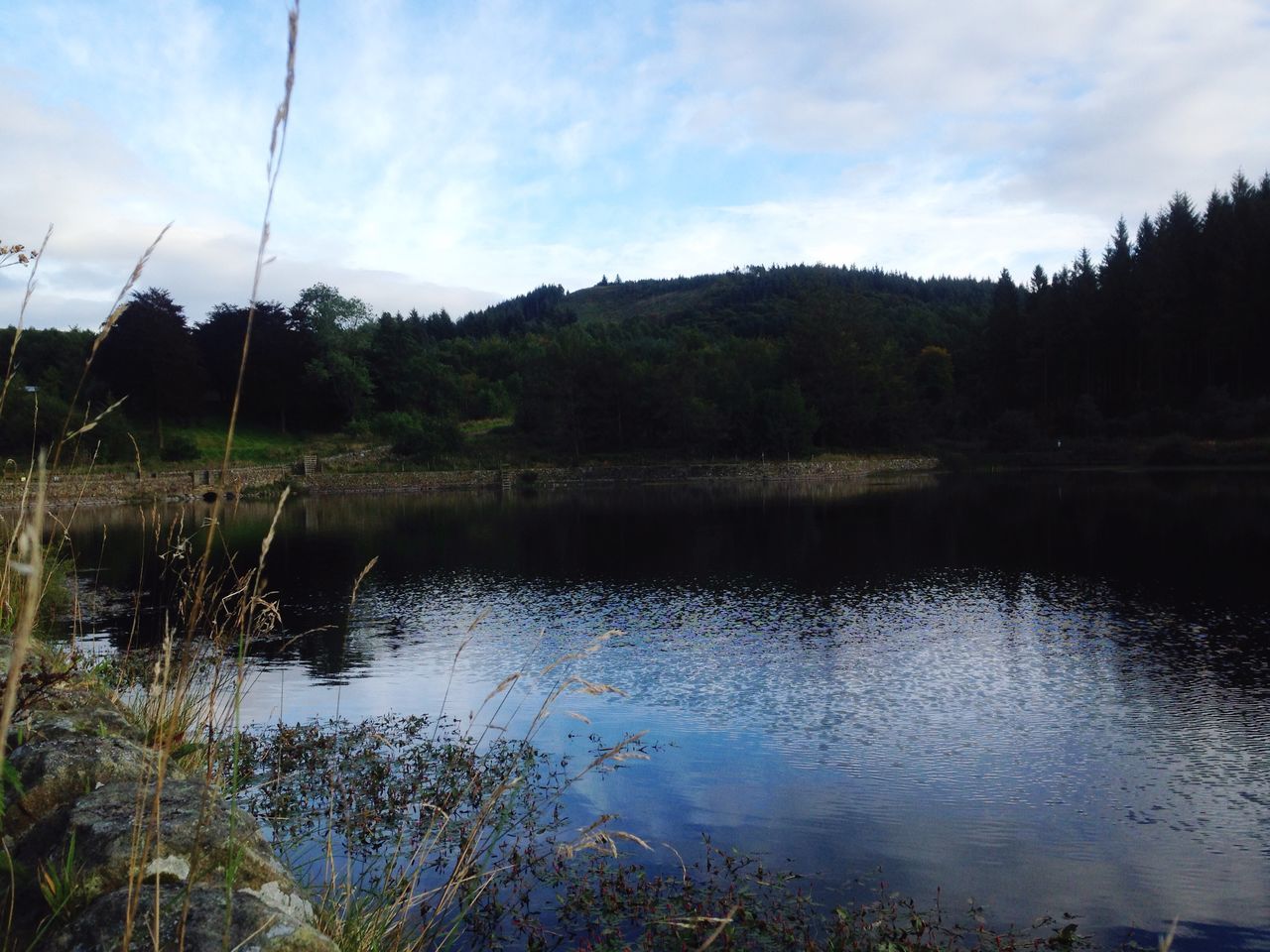 water, lake, tranquil scene, tranquility, sky, reflection, scenics, mountain, beauty in nature, tree, nature, cloud - sky, cloud, idyllic, countryside, mountain range, non-urban scene, calm, non urban scene, lakeshore