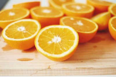 Close-up of fresh sliced oranges on cutting board