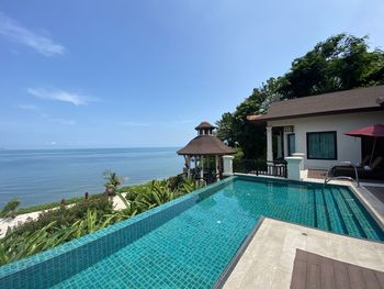 View of swimming pool against blue sky