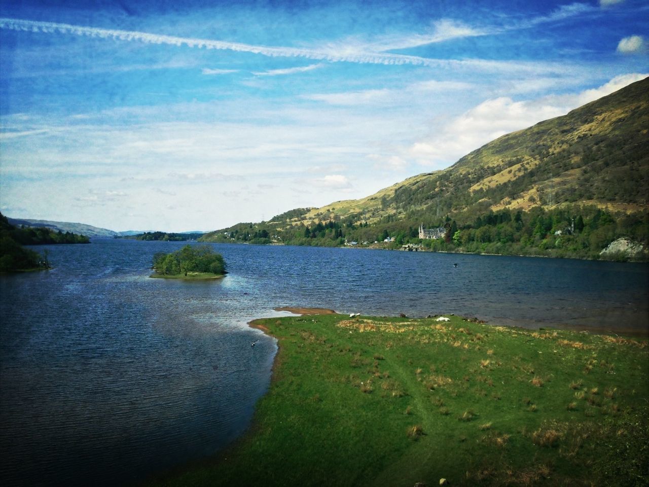 water, sky, tranquil scene, mountain, tranquility, scenics, beauty in nature, cloud - sky, lake, nature, cloud, blue, mountain range, landscape, river, idyllic, non-urban scene, day, rippled, outdoors