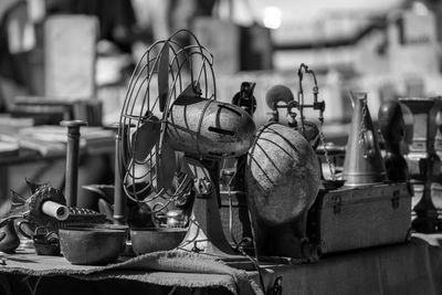 Close-up of old equipment on table