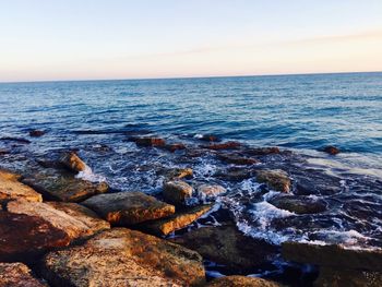 Scenic view of sea against clear sky