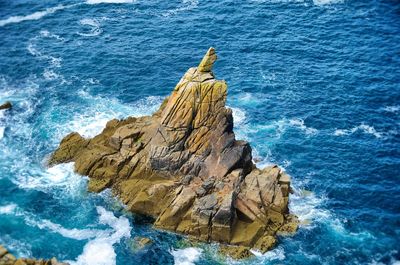 Scenic view of sea against blue sky