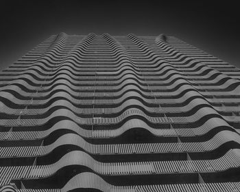 Low angle view of building roof against sky