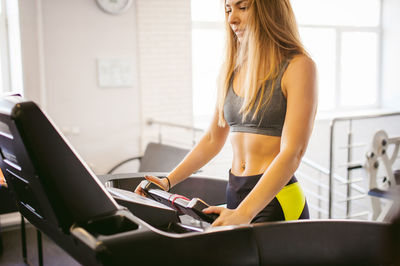 Woman exercising in gym