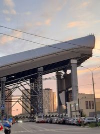 Low angle view of bridge against sky during sunset