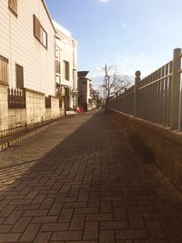 Cobblestone street against sky