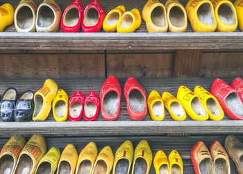 Full frame shot of clogs on shelves in store