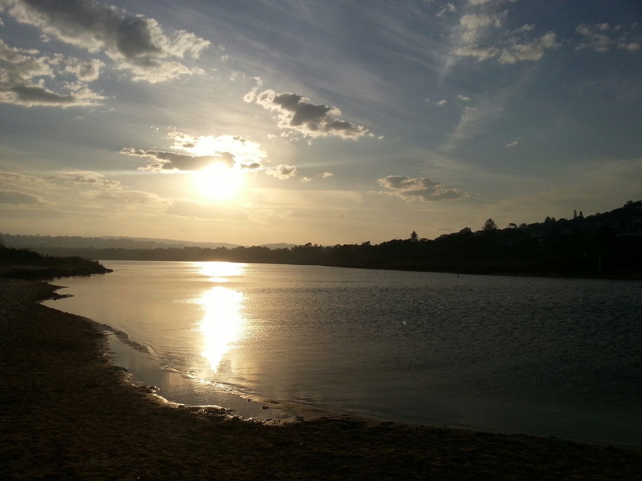 water, sunset, sun, tranquil scene, scenics, tranquility, reflection, sea, sky, beauty in nature, beach, idyllic, sunlight, nature, horizon over water, shore, cloud - sky, silhouette, sunbeam, cloud