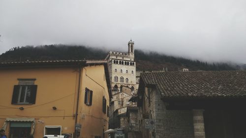 Low angle view of built structures against sky