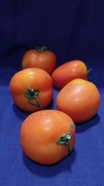 Close-up of oranges on table