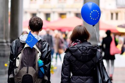 Rear view of people with balloons