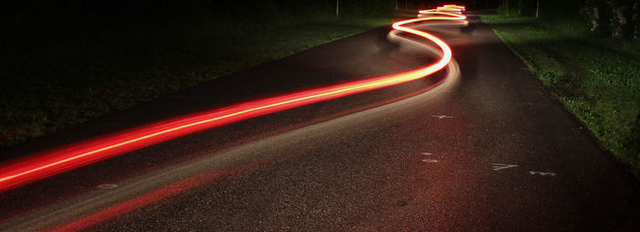 Light trails on road at night