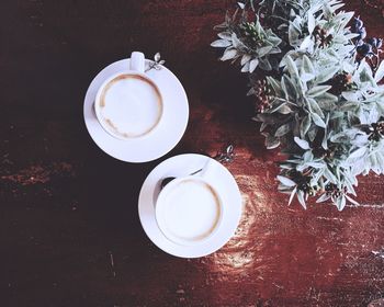 Directly above shot of coffee cup on table