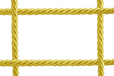 Close-up of rope against white background