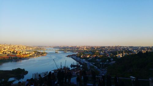 River in city against sky