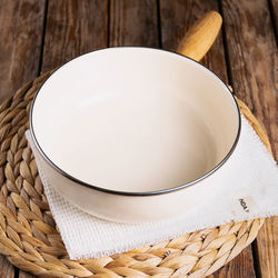 High angle view of wicker basket on table