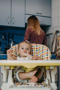 Portrait of mother and girl