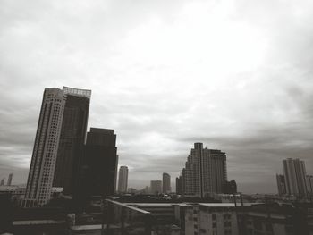 Low angle view of buildings in city against sky