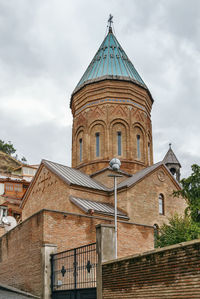 Low angle view of temple building against sky