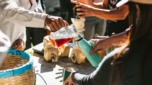 People with drinks on table